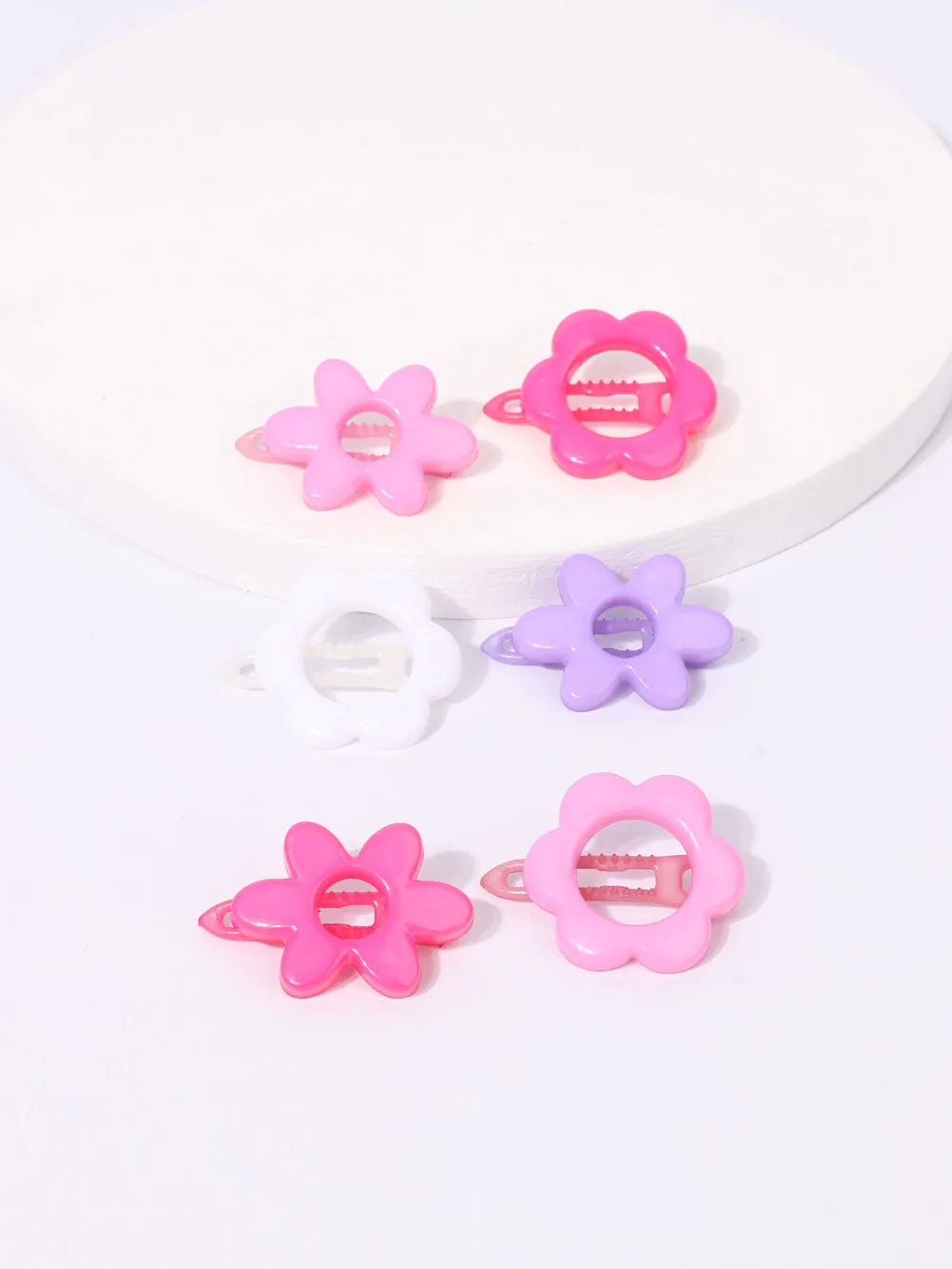 Hebillas clips flor por par