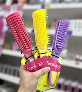 cepillo dompel para rulos original